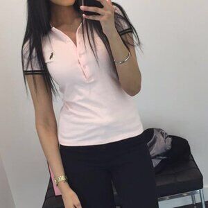 OVO Women's pink polo shirt